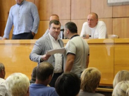 Депутату Рубежанского городского совета угрожали убийством во время сессии (фото)