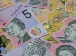 В Австралии выпустили анимированные доллары с прозрачными окошками