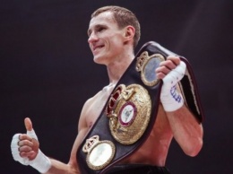Российский боксер Трояновский защитил титул чемпиона мира по версии IBF и IBO