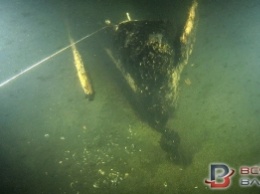 Дайвер обнаружил затонувшую лодку конца 19 века (ВИДЕО)