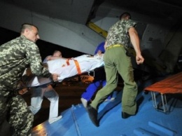 В Запорожье на вертолете доставили раненного в голову военного