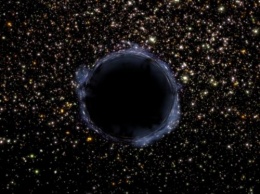 «Голодающая» черная дыра вызвала потускнение яркой галактики