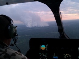 К тушению пожара под Чернобылем привлекли самолеты