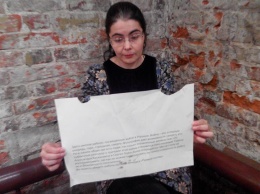 В Москве разгромили фотовыставку о "героях АТО" в Сахаровском центре