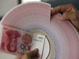 Китайский юань стал частью валютной корзины МВФ