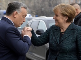 Меркель и Орбан договорились об уступках по мигрантам - СМИ