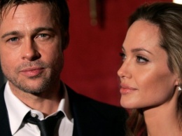 Брэд Питт попросил отца Джоли помирить его с женой