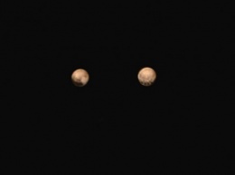 Странные пятна расположенные в ряд обнаружены на поверхности Плутона