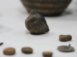 Древнюю погремушку в виде головы нашли археологи