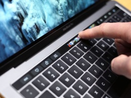 Сенсорная панель Touch Bar в новых MacBook Pro работает под управлением iOS