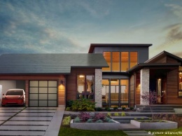 Tesla представила крышу для дома, изготовленную из цельной солнечной панели