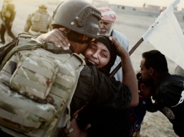 Журналист в фоторепортаже рассказал, как иракские войска освобождают Мосул от ИГ