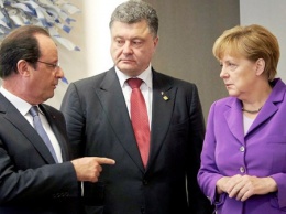 Главы государств Украины, Германии и Франции выступили за отвод оружия крупного калибра на Донбассе