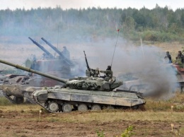 ОБСЕ: зафиксировано 18 танков и 42 БТР около линии разграничения