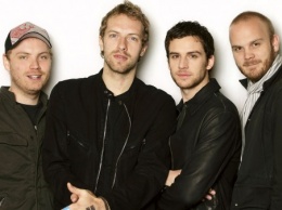 Во время концерта Coldplay в Мельбурне фанат со сцены сделал предложение девушке