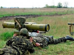 Украинские бойцы разбили танк боевиков с 12 раза