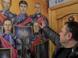 На стенах херсонской часовни нарисовали лица погибших АТОшников (видео)