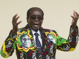 Президент Зимбабве прибыл на партийный съезд в молодежном пиджаке