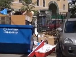 В центре Москвы около мусорного бака найдет гроб