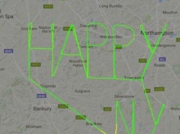 В небе над Великобританией пилот нарисовал новогоднее поздравление