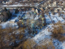 В парке Шеловичном в Славянске демонтируют аттракционы и запустят обновленное колесо обозрения
