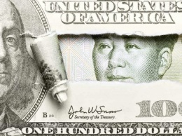 Китай готов отказаться от облигаций США ради спасения юаня