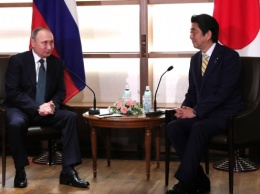 Премьер-министр Японии планирует дважды посетить Россию в 2017