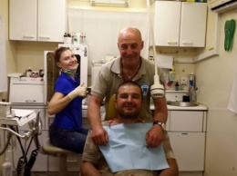 Запорожские дантисты поставили тысячному пациенту-"атошнику" патриотическую пломбу