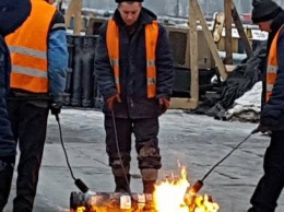 В Киеве будут подогревать дорогу на Одесской площади (фото)