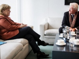 Меркель и Гир поговорили о кино и политике