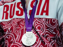 Российские медалисты ОИ начали сдавать награды в МОК
