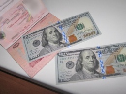 На Сумщине пытались подкупить пограничников долларами США и российскими рублями (+фото)