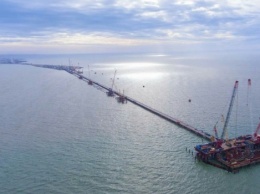 Чиновники объяснили заморозку строительства дорог расходами на Керченский мост