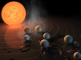 Телескоп НАСА открыл семь потенциально обитаемых "сестер" Земли