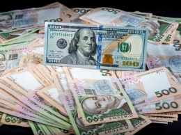 НБУ укрепил официальный курс гривни до 26,97 грн/доллар