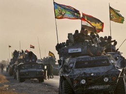 Силы безопасности Ирака в воскресенье предприняли наступление на четыре западных пригорода города Мосула