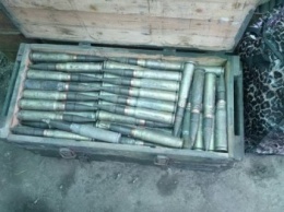 CБУ обнаружила тайник с большим количеством боеприпасов в районе АТО