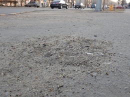 Одесские улицы с зимы завалены песком (ФОТО)