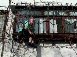 В Киеве пенсионерка застряла в оконных решетке