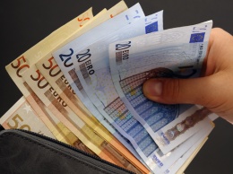 Украинцы доверяют доллару в 3,5 раза больше, чем евро