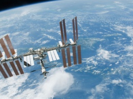 Спускаемый аппарат с тремя членами экипажа МКС приземлился в Казахстане