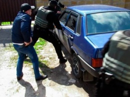 Херсонские полицейские задержали участников ОПГ, которые сняли более 10 млн грн с банковских карточек жителей Украины (фото)