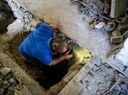 В подземелье замка под Запорожьем нашли останки (Фото)