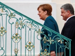 О чем умолчал Порошенко после встречи с Меркель