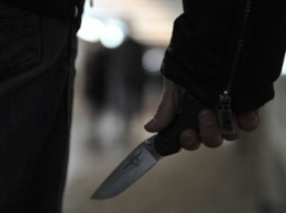 В Днепре мужчины, угрожая ножом, ограбили афроамериканцев