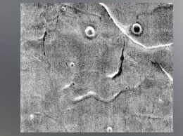 NASA показало новое «лицо» на поверхности Марса