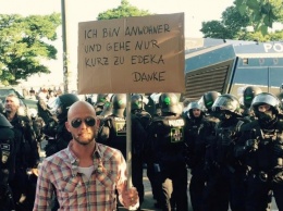 "Я просто здесь живу!" Жители Гамбурга не могут выйти на улицу из-за протестов