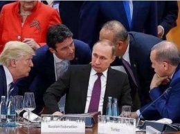 РосCМИ "дорисовали" Путина в пустое кресло на G20