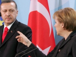 Меркель приняла позицию Эрдогана по сирийским беженцам, но не согласна с арестами его оппонентов