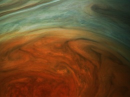 NASA опубликовало первые приближенные фото Большого красного пятна на Юпитере